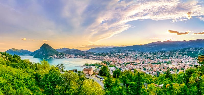 Lugano im Sonnenuntergang - ©©pure-life-pictures - stock.adobe.com