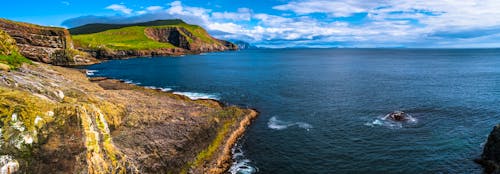 Panoramic view of Mykines at Faroe islands and North Atlantic puffins &ndash; &copy; neurobite - stock.adobe.com