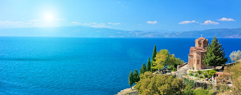 St. Jovan Kaneo church overlooking Ohrid lake, Macedonia on a su - ©©Ljupco Smokovski - stock.adobe.com