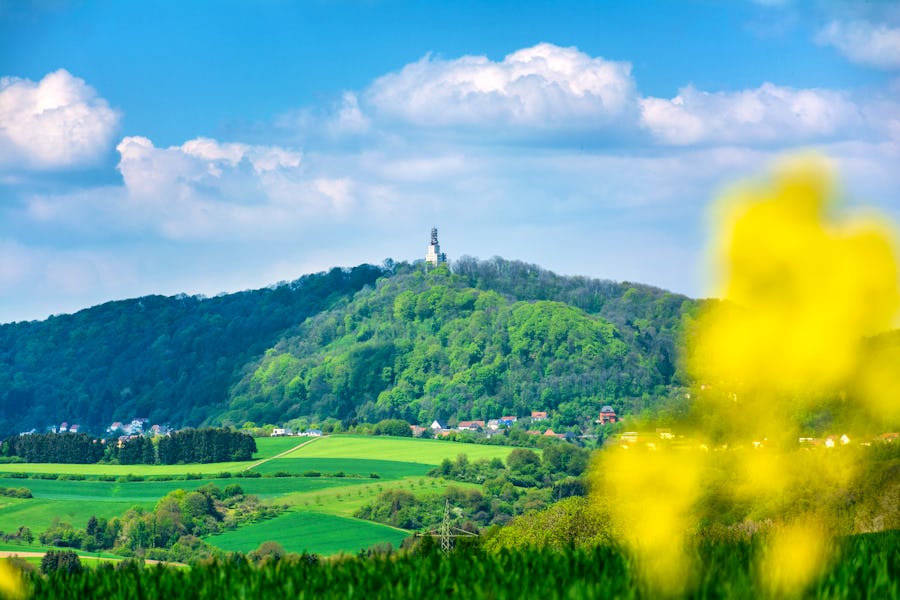 Saarland - Blick auf Tholey und den Schaumberg mit Schaumbergturm im Frühling – © ©Petair - stock.adobe.com