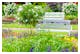 Parkbänke in einer romantischen Gartenanlage – © mstein - stock.adobe.com