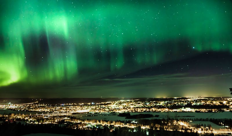 Polarlichter über Rovaniemi in Finnisch Lappland - &copy;Jasim - stock.adobe.com