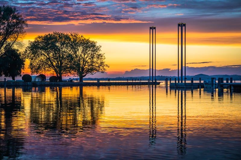 Bregenz am Bodensee - Sonnenuntergang am Hafen - ©Alexander Reichel - stock.adobe.com
