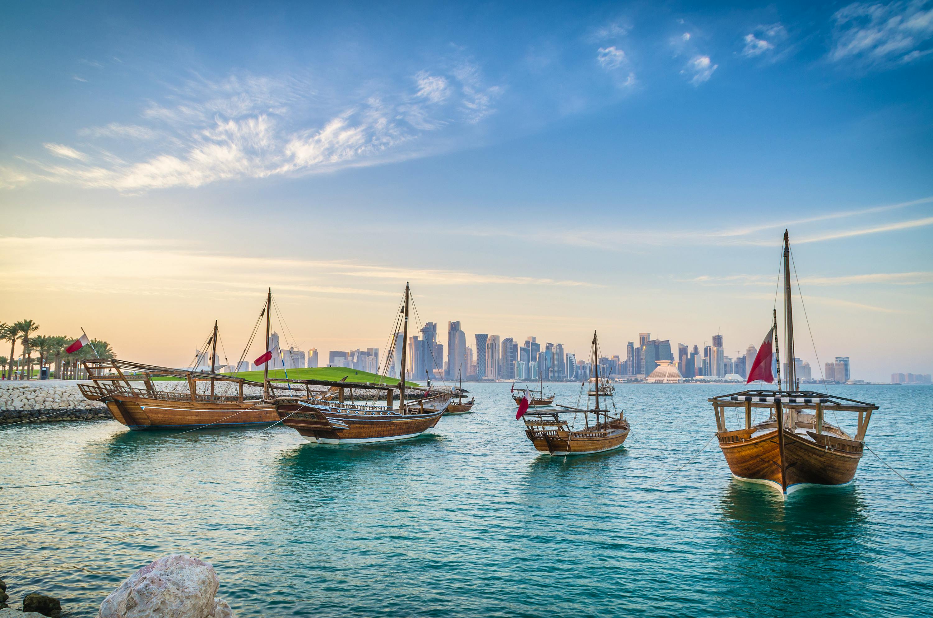 Dhows moored off Museum Park in central Doha, Qatar, Arabia, with some of the buildings from the city's commercial port in the background.&nbsp;&ndash;&nbsp;&copy;&nbsp;matpit73 - Fotolia