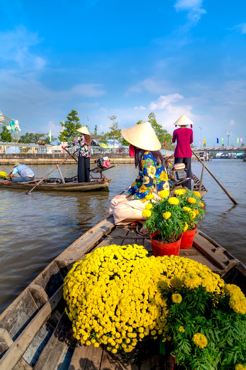 Mekong-Delta in Vietnam - Boote auf dem Weg zum Blumenmarkt - ©quangpraha1981@gmail.com