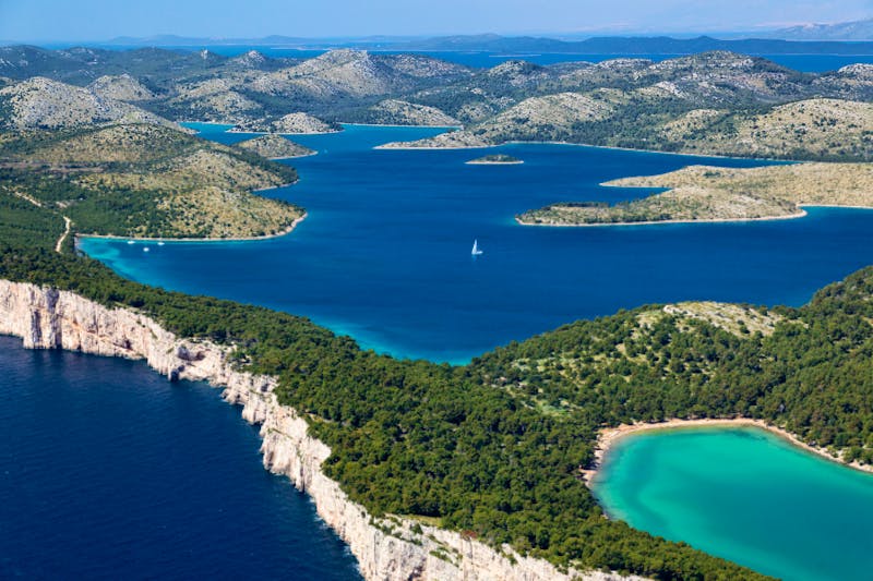 Aerial view of Telašćica Nature Park with the bay, cliffs and the salt lake - ©Goran - stock.adobe.com
