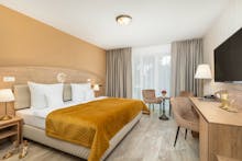 Zimmerbeispiel Doppelzimmer Comfort im JUVENA WELLNESS & SPA - Hotel**** – © IdeaSpa
