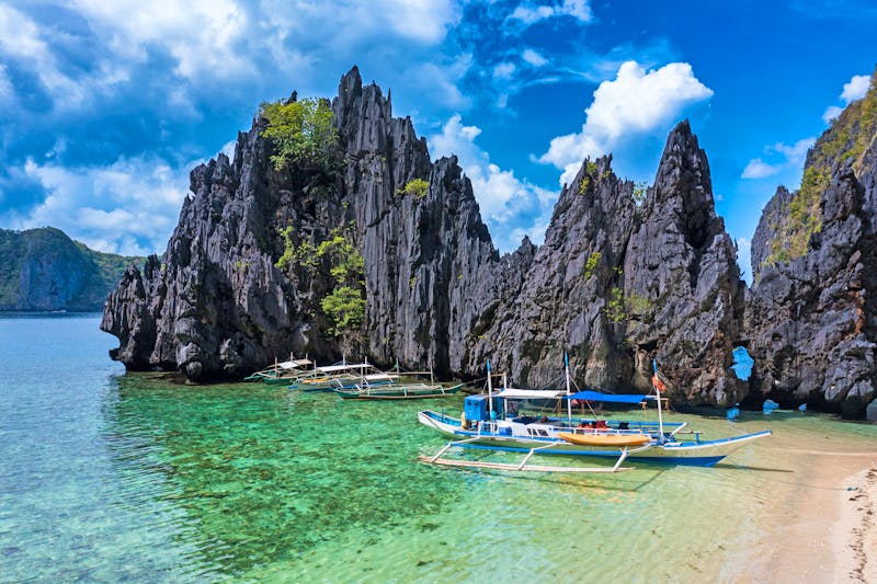 Miniloc Island - Boote in der Secret Lagoon - ©Hector - stock.adobe.com