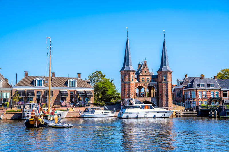 Sneek in Friesland - Hafen und historisches Wassertor  - ©Sina Ettmer - stock.adobe.com