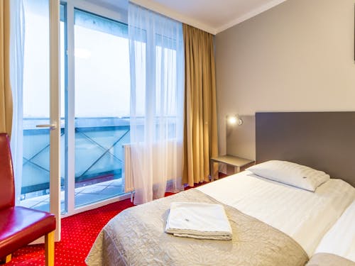 Zimmerbeispiel Doppelzimmer mit Balkon im Hotel New Skanpol &ndash; &copy; IdeaSpa