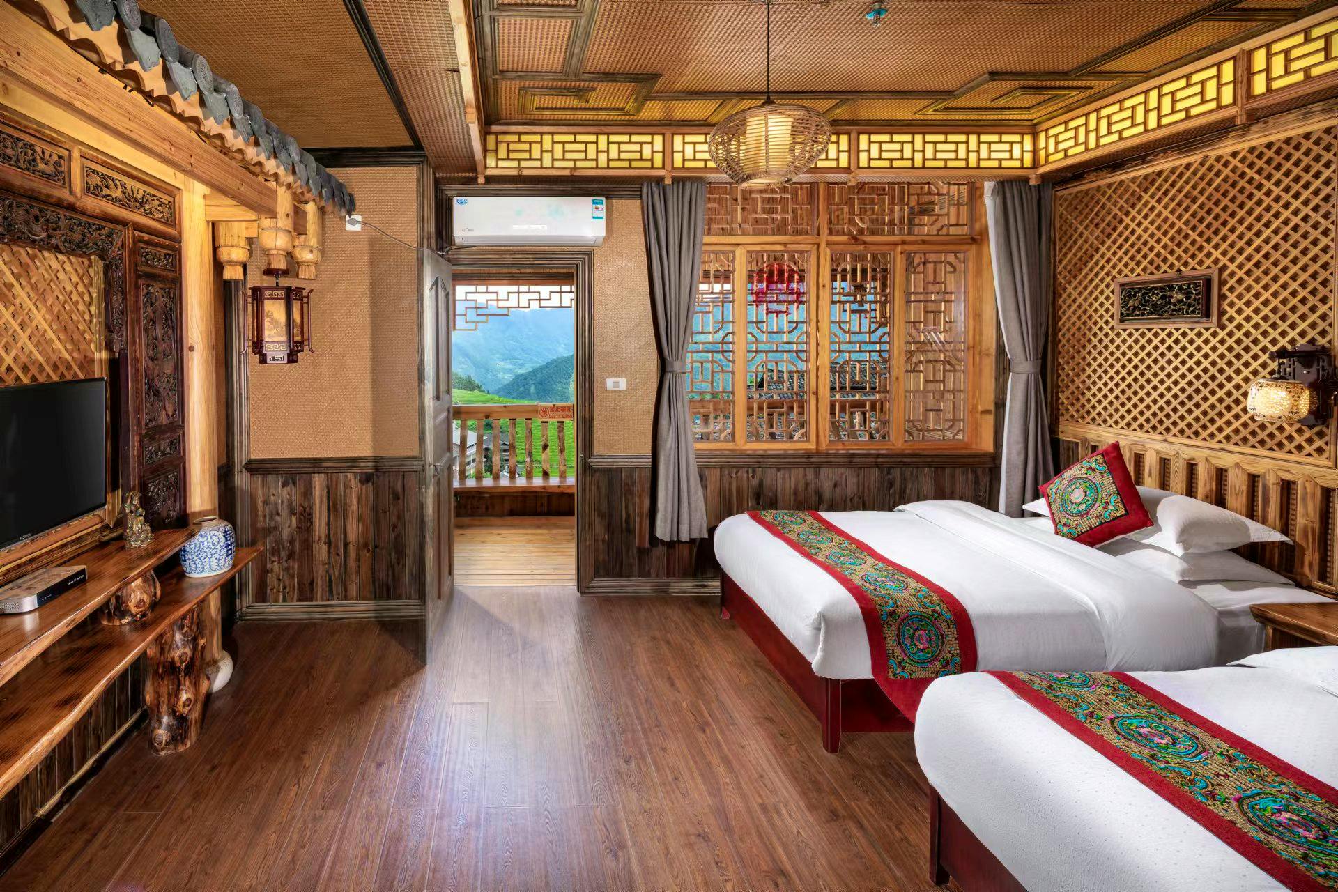 Twinbett-Zimmer Beispiel im Ping’an Gästehaus in Longsheng&nbsp;&ndash;&nbsp;&copy;&nbsp;Ping’an Hotel Longshen