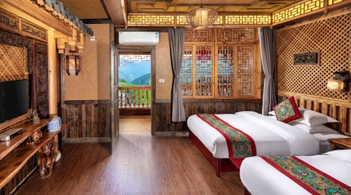 Twinbett-Zimmer Beispiel im Ping’an Gästehaus in Longsheng – © Ping’an Hotel Longshen
