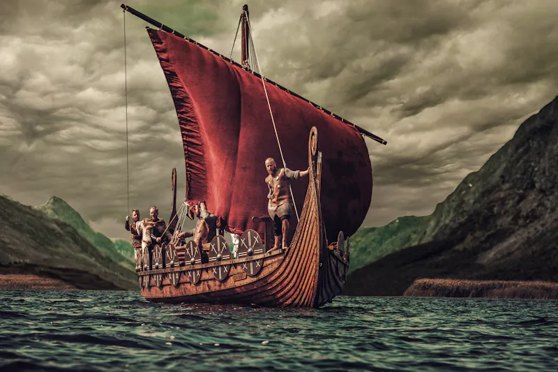Eine Gruppe von Wikingern auf einem Drakkar - &copy;Nejron Photo - stock.adobe.com