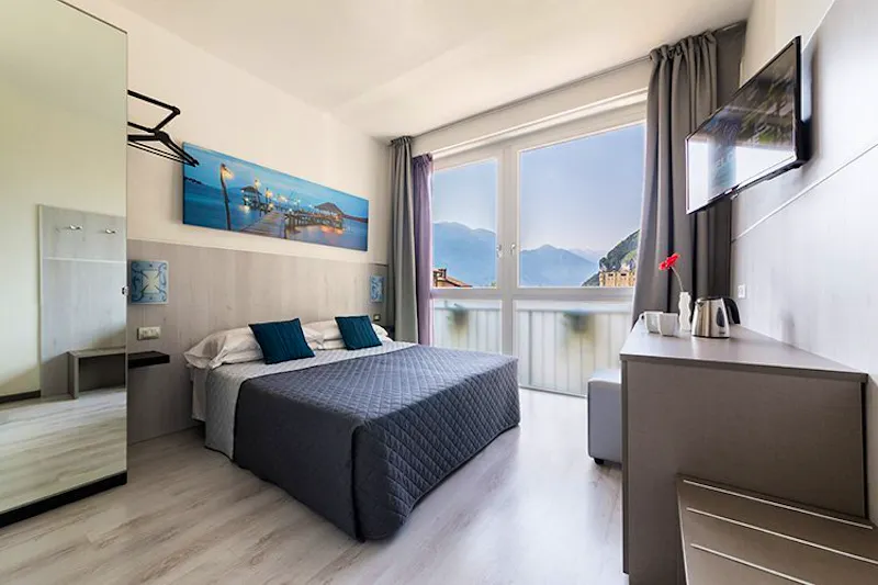 Hotel Canarino in Riva del Garda - Zimmerbespiel &ndash; &copy;Fabio Staropoli. www.fotofiore.com