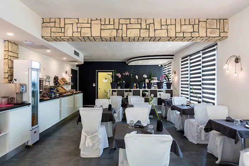 Hotel Canarino in Riva del Garda - Frühstücksraum &ndash; &copy;Fabio Staropoli. www.fotofiore.com